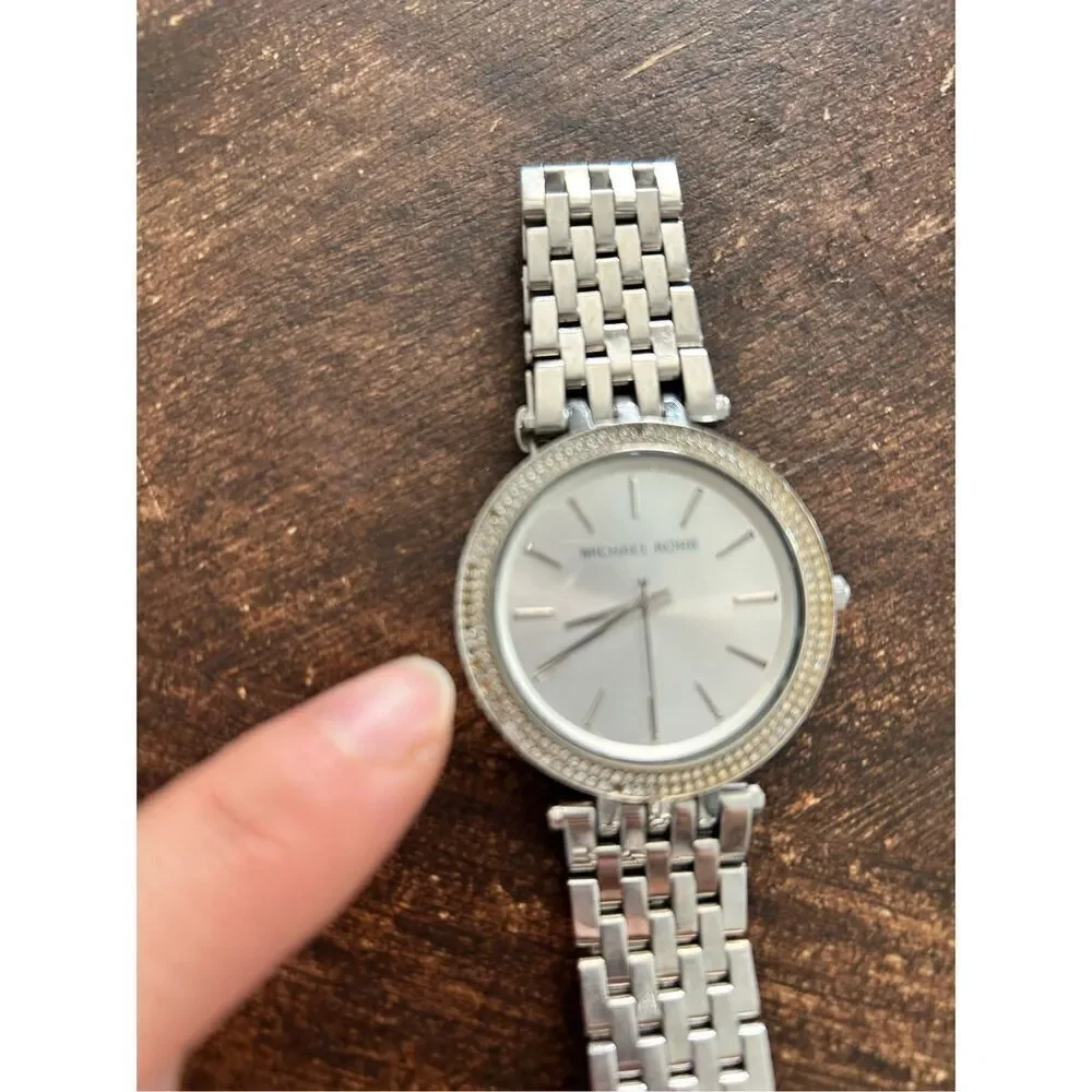 Michael Kors silver color faux diamond watch fits a small wrist 5 inches laying